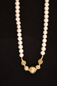 NECKLACE . PEARL TAMBRUIN BEAD