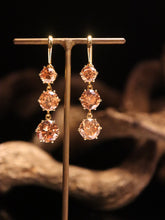 Load image into Gallery viewer, EARRINGS . GRADUATED ROUND CUT TOPAZ
