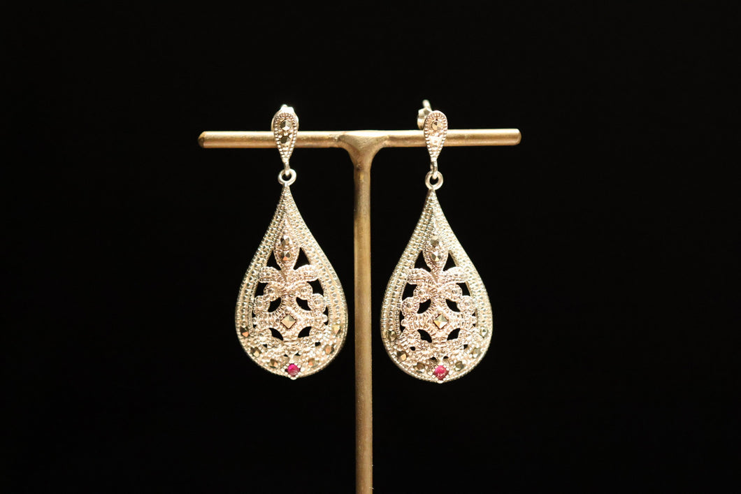 EARRINGS . MARCASITE AND RUBY