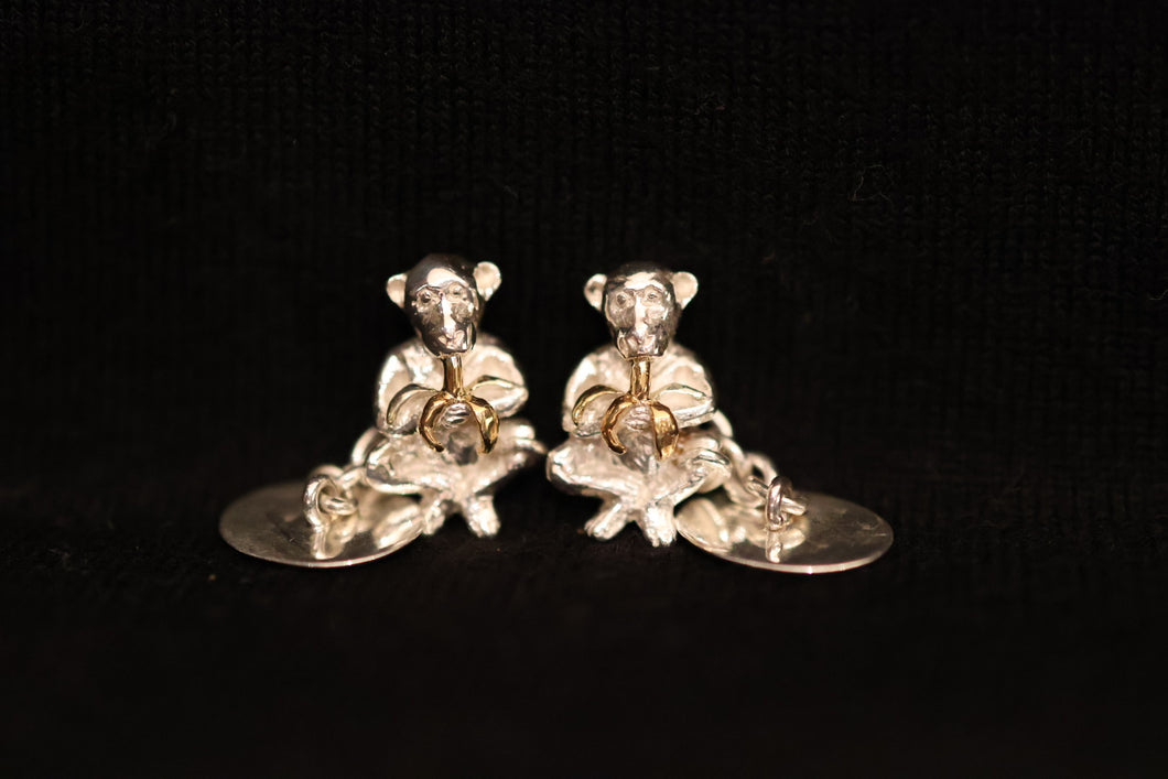 CUFFLINKS . MONKEY